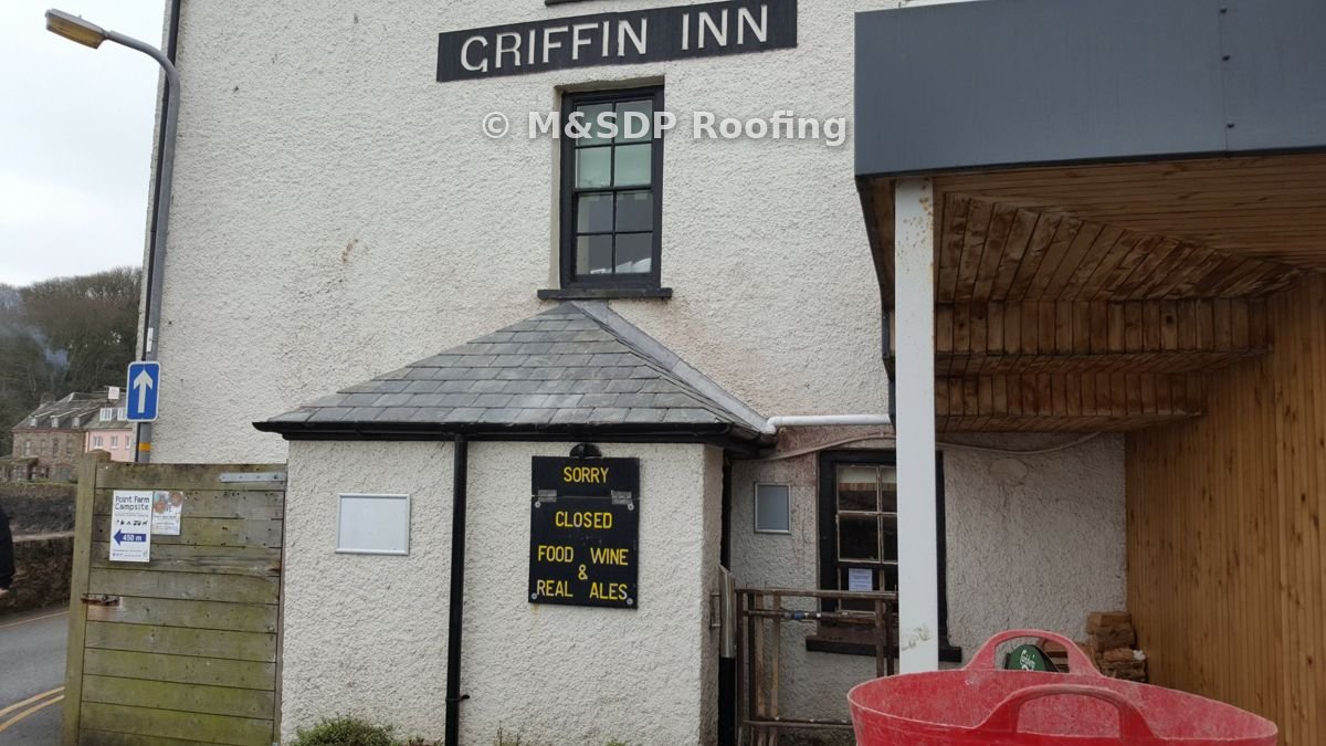 Finished porch roof below the Griffin Inn sign