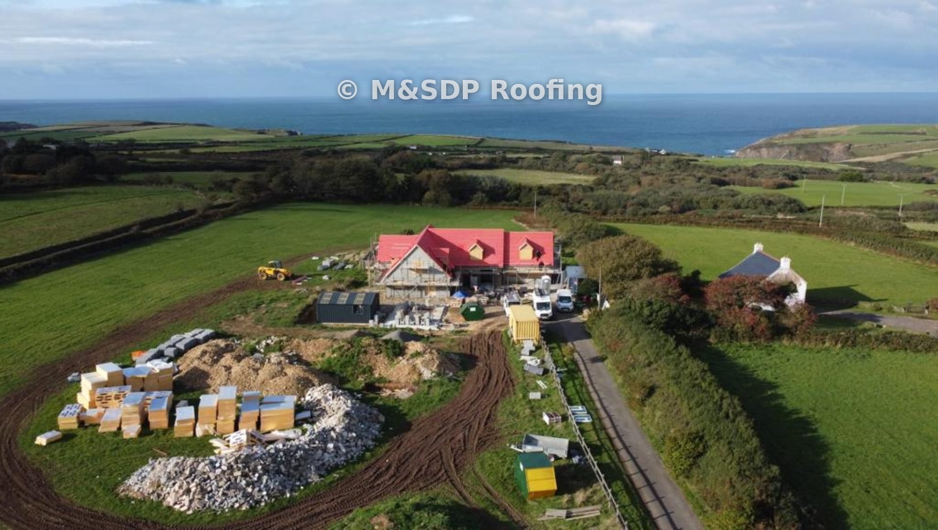 Drone view of the site with the sea beyond